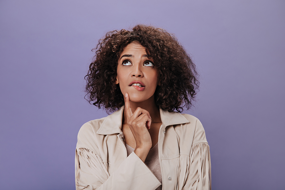 A thoughtful woman reflects on everyday choices that help reduce plastic waste and support a more sustainable and environmentally friendly lifestyle. A thoughtful woman reflects on everyday choices that help reduce plastic waste and support a more sustainable and environmentally friendly lifestyle.